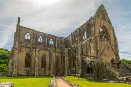 The route of covered passage from the Infirmary Hall to the Abbey Church at Tintern Abbey - a stop on our sightseeing tours of Wales.